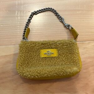 Coach yellow mini shearling bag
